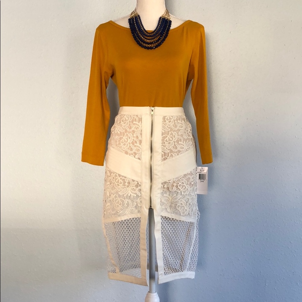 Fun multi textured white skirt.